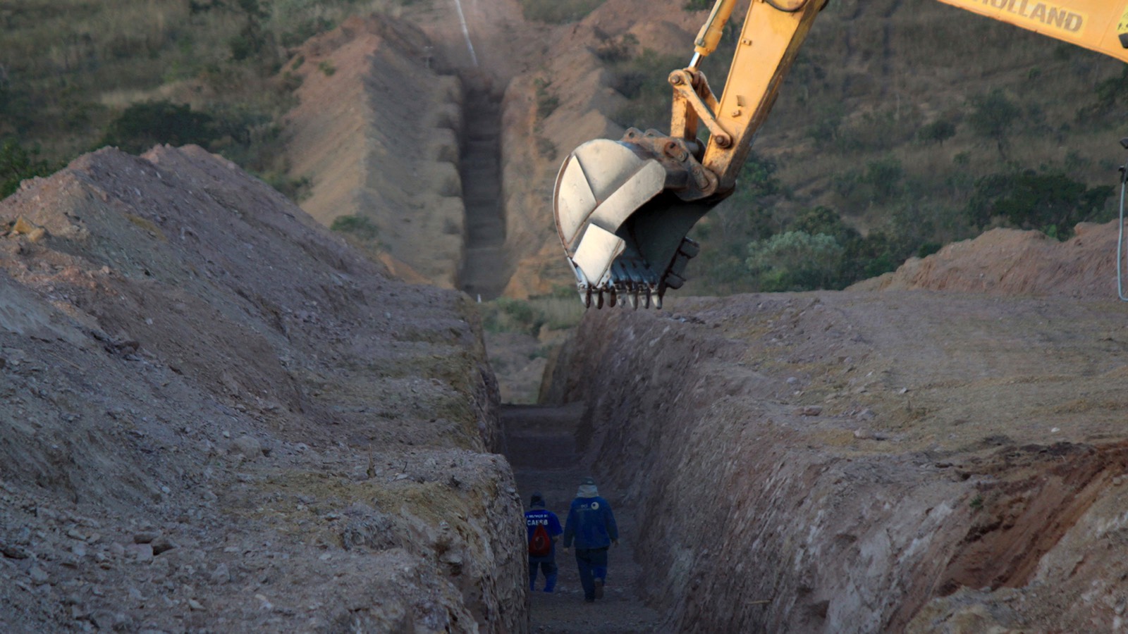 Excavated trench prepared for pipeline installation on site